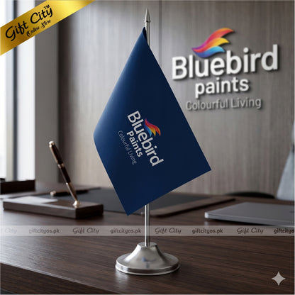 Bluebird Paints table flag on a desk with office background